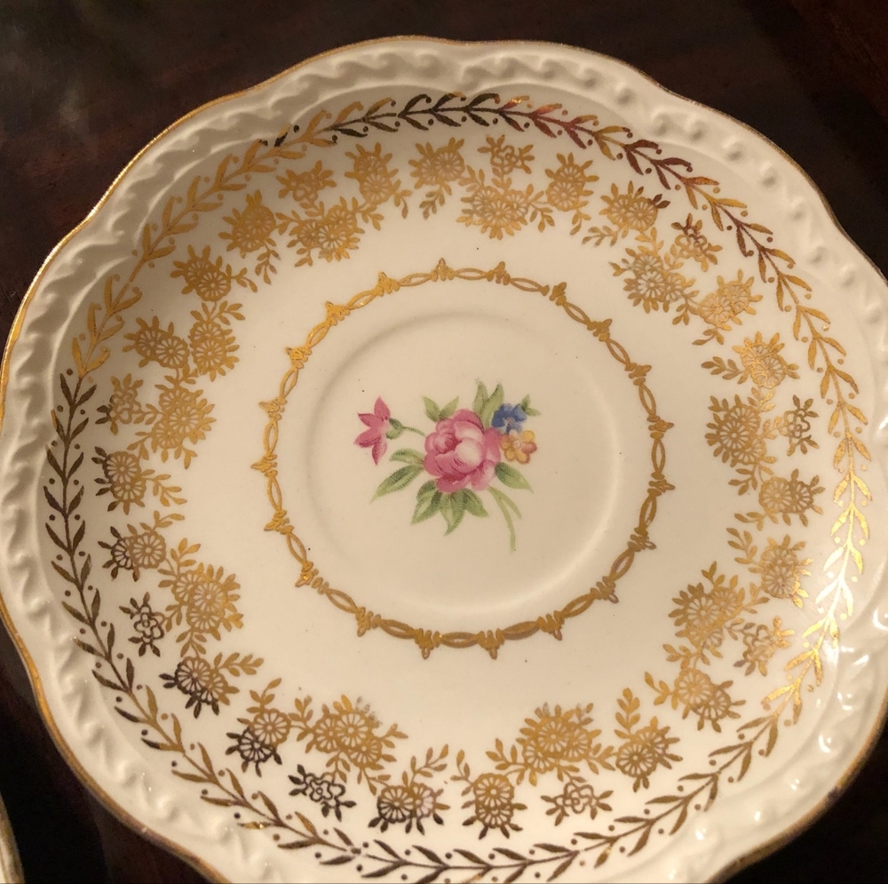 American Beauty pattern in ivory with pink rose,  "22kt" gold. Rare find